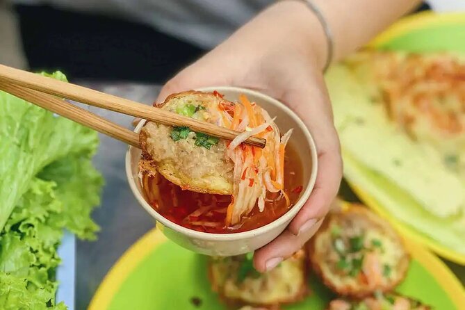 Ho Chi Minh Walking Street Food Tour (Safe & Fun) - Seafood-to-sit-down comfort: bo la lot and Hue beef soup