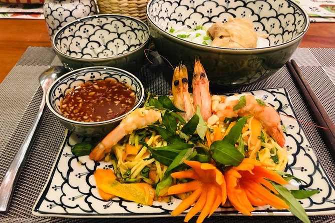 Immersive Cooking Class & Wet Market Tour by Local Chef +Cookbook - What you’ll cook: spring rolls, pho, and other Saigon favorites
