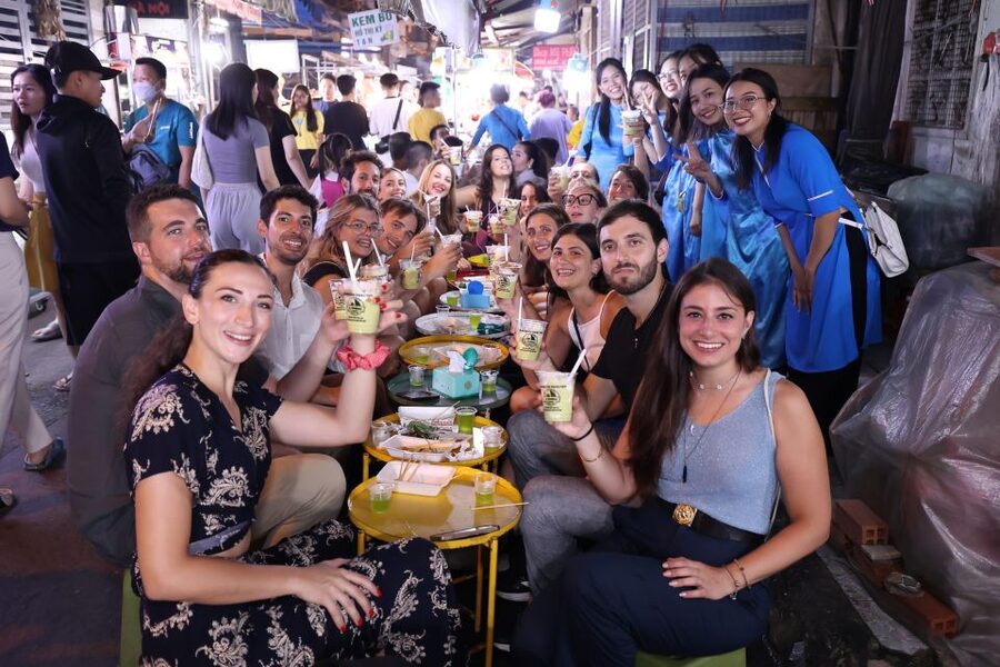 KISSTOUR| Saigon By Night & Street Food Tour on Motorbike - Your Guide in Ao Dai, and Why the Ride Feels Safer
