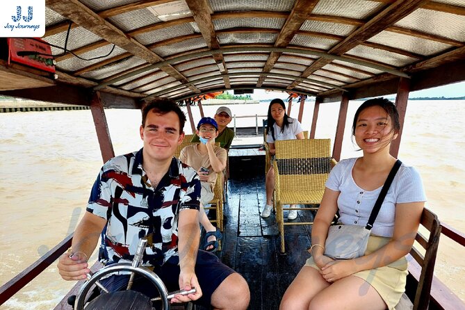 Mekong Delta 'Cai Rang' Floating Market 2-Day Tour - Day 1 on the river: fruit, coconut juice, and a local lunch stop