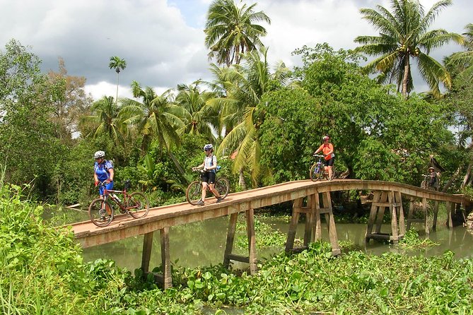 Mekong delta cycling tour 3 days - Day 1: Fruit Farms, Cai Be Floating Market, and a Mekong Sunset Cruise