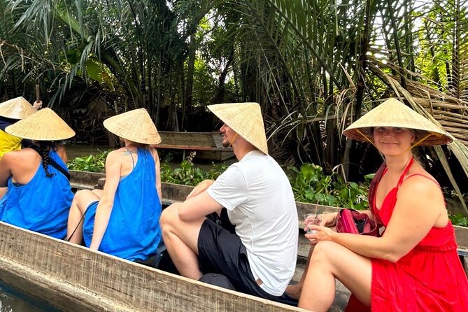 Mekong Delta Guided Tour from Ho Chi Minh City - Into Smaller Canals by Row Boat: Under Bridges, Over Plants