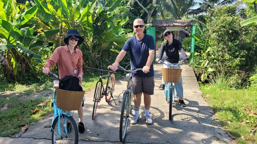 Mekong Delta Nature Private Day Trip: Bicycle-Kayak-Cano... - Bicycle through rice fields toward Xom Trau Pagoda