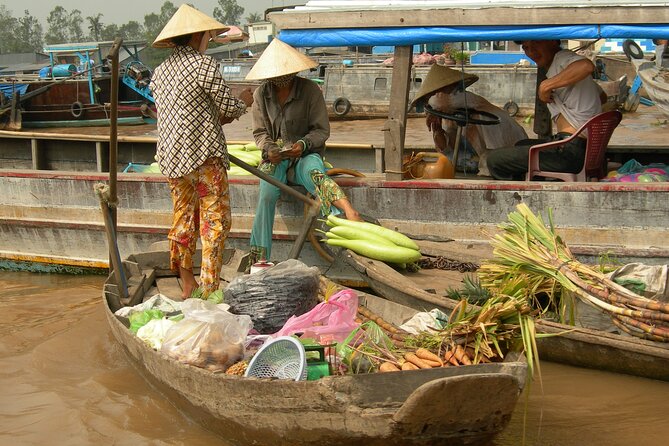 Mekong Delta Tours CanTho 2days - Boat cruise in natural waterways - Cai Rang Floating Market: early timing and real wholesale energy