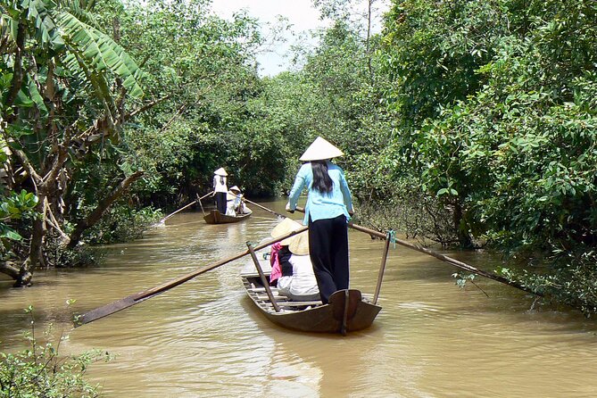 Mekong Delta Tours CanTho 2days - Boat cruise in natural waterways - Cai Be Floating Market: boats, bridges, and riverside production