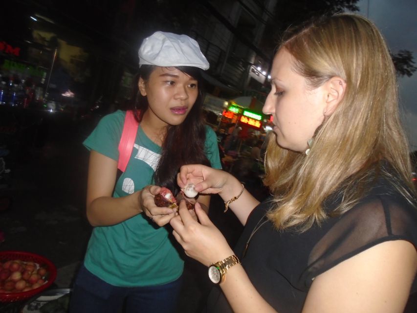 Midnight Street Food Tour In Saigon By Motorbike - Flower market under lights and old Saigon houses