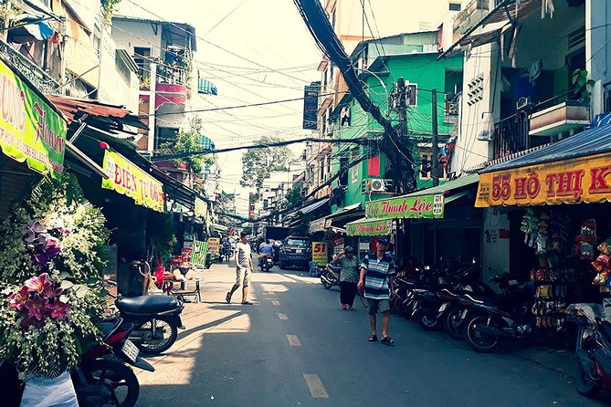 Morning Saigon Unseen+Street Food Tour with Ao Dai Riders Option - District 4 spring roll vermicelli in the mafia-area vibe