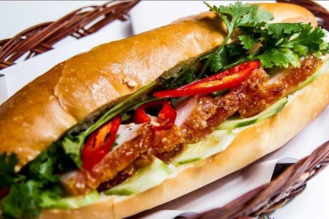 Morning Walking Food Tour in Non Tourist Area and Full of Local Life - Snack mission in cool morning hours: banh mi heo quay and banh khot