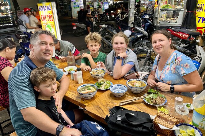 Motorbike Food Tour in Saigon Real Local Flavors - Stop 5 at Ba Son Harbour Park: Ba Son Bridge lights for the final photo