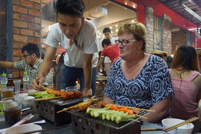 Motorbike Night Adventure in Ho Chi Minh City - Two Local Diner Stops, Including BBQ, Plus Drinks