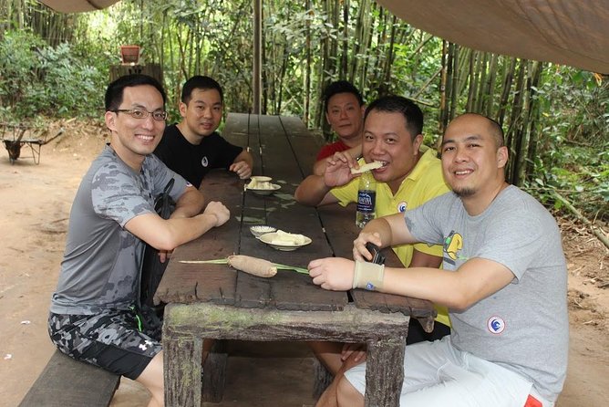 Private Cu Chi Tunnels & Mekong Delta 1 Day - The war-time snack moment: tapioca and pandan tea make the day click