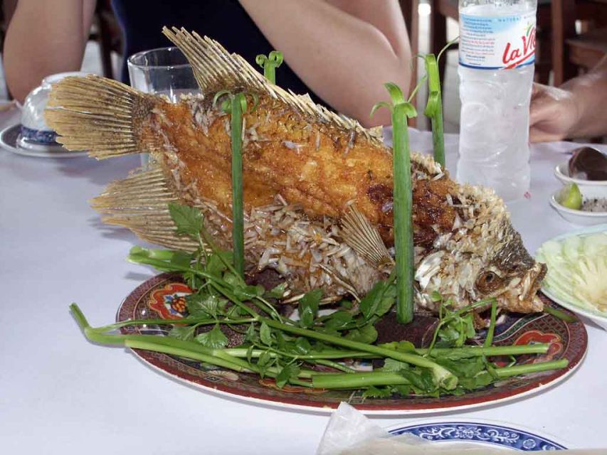 Private Cu Chi Tunnels & Mekong Delta: Full-Day Guided Tour - Rowboat through small waterways, plus fruit and coconut country