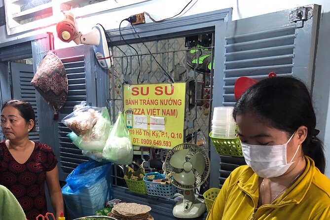 Private Half-Day Bike Tour in Saigon with Guide - Ho Thi Ky Flower Market in District 10 for the night food trip