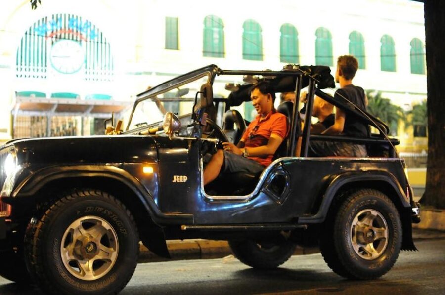 Private Jeep Tour Saigon by Night & Cruise Dinner with Music - Saigon’s French landmarks look best when they move