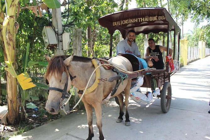 Private Mekong Delta Tour – Boat Ride & Local Lunch - Rowing boat through coconut canals (the slow part that makes it worth it)