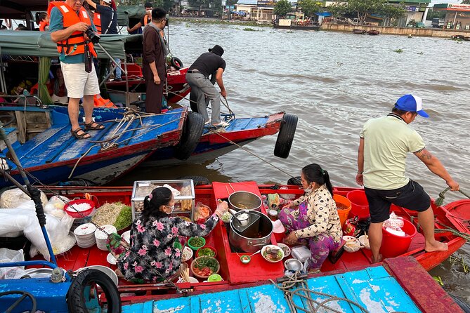 Private Scooter Street Food Tour in Saigon with 11 Tastings - Old neighborhoods and Bún bò Huế: comfort soup with local attitude