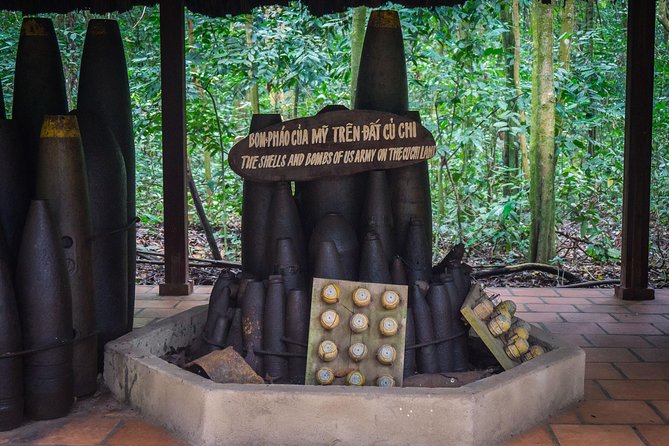Private Tour to Explore Cu Chi Tunnels and Mekong Delta - Coconut candy mill, honey tea, and sampan canal rides under coconut shade