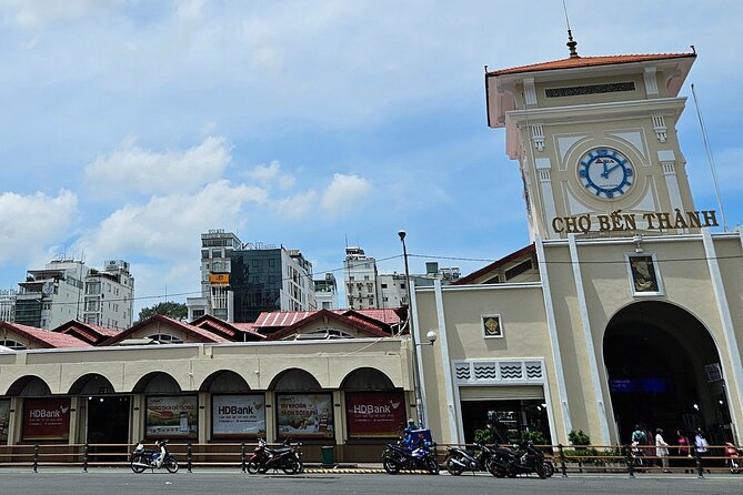 Private Walking Half Day Tour in Ho Chi Minh City - Coconut coffee, then Notre Dame Cathedral and Central Post Office side-by-side