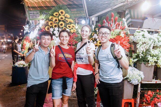 Saigon After Dark Night Tour by Scooter + 7 tastings - Chinatown after dark: the market stop that sets the mood