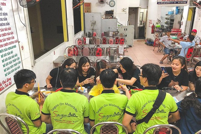 Saigon Afternoon Unseen Street Food by Scooter |Opt: Ao Dai Rider - Comfort, rain, and the Ao Dai rider option