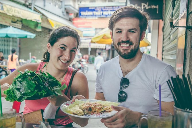 Saigon Authentic Walking Street Food Tour 12+ Tastings Included - Guide quality is the hidden engine here