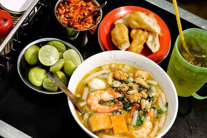 Saigon Backstreets City Tour on Scooter including Food - Guide Quality on Scooters: Names Matter Here