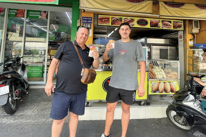 Saigon By Night: Authentic Street Food Scooter Adventure - Bánh mì at the secret vendor: the crunch test