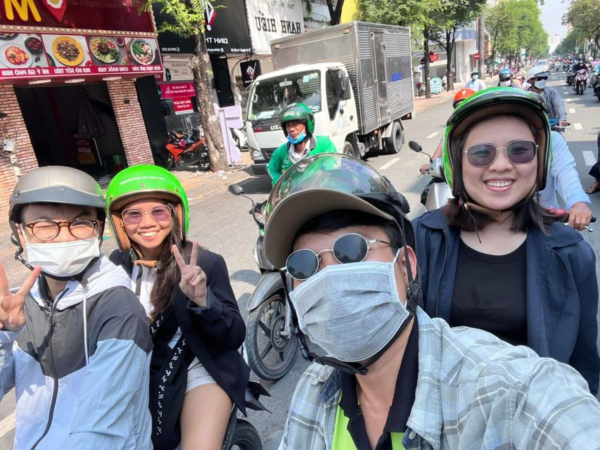 Saigon: City Highlights & Unseen Tour|Opt: Female Riders - Ho Thi Ky Flower Market: roses, orchids, and photo-worthy chaos