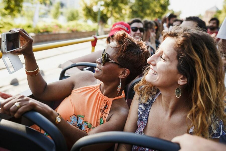 Saigon: City Sightseeing Hop-On Hop-Off Bus Tour - Audio Guide, Headphones, and the Reality of Recorded Narration