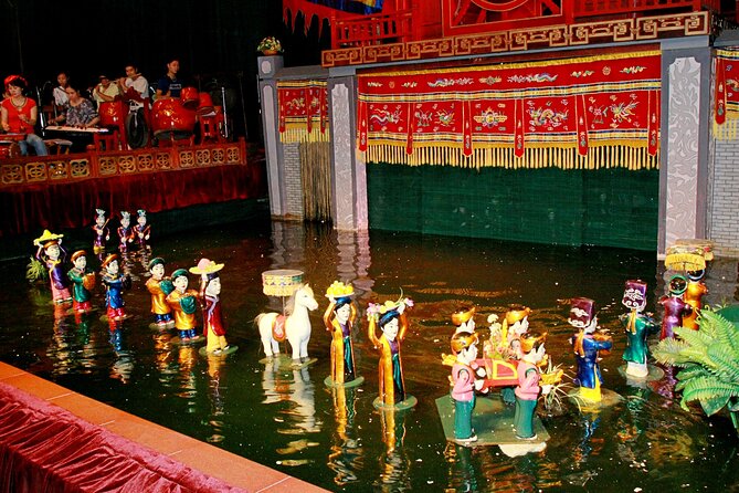 Saigon Evening: Water Puppet Show & Dinner Cruise Experience - Golden Dragon Water Puppet Theater: bamboo rods, live orchestra