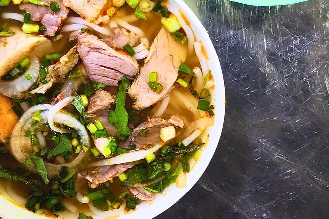 Saigon Food Tour by Scooter with Eleven Tastings - District 10 Street Food Circuit: Crispy Rice, Fried Bao Buns, and More