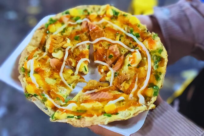Saigon Food Tour by Scooter with Eleven Tastings - Ho Thi Ky Flower Market Break: Vietnamese Pizza and Stuffed Snails