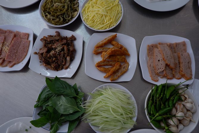 Saigon luxury food tour on motorbike with 10 authentic dishes - Five districts and off-the-beaten-path eateries: what to expect between bites