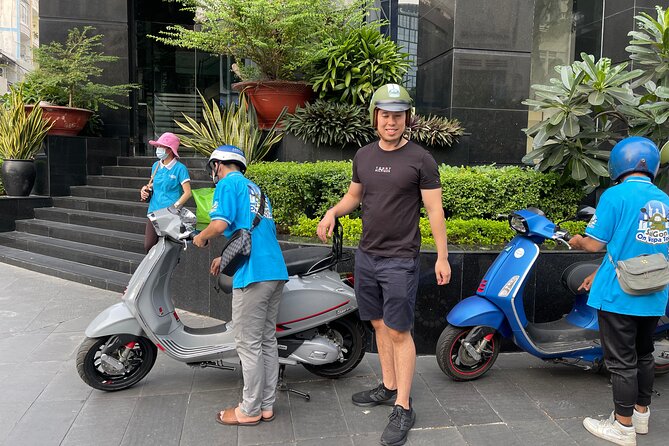 Saigon Morning and Afternoon Adventure by Vespa - Pickup, open-faced helmets, and the private-ride feel
