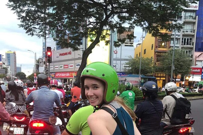 Saigon Night Scooter Experience And Local Food - Flower market vibes, then District 7’s wealth and views