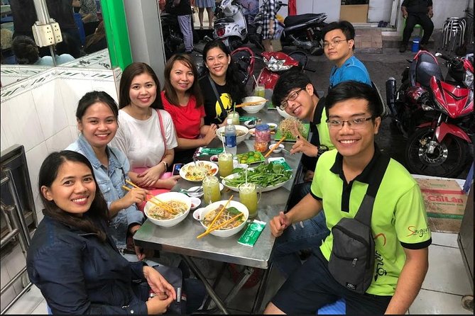 Saigon Night Sights & Local Food by Motorbike| Opt: Ao Dai Riders - Saigon after dark feels like a living movie