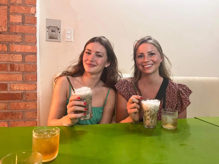 Saigon: Night Sightseeing And Street Food Tour By Vespa - Stop One: Grilled Pork Vermicelli and Spring Rolls