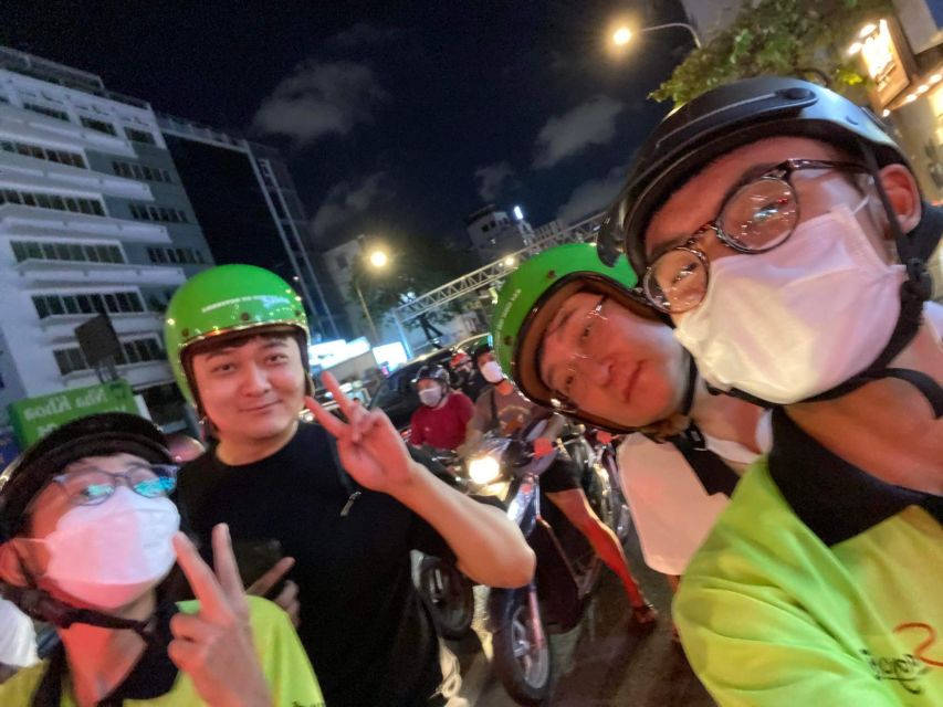 Saigon: Night Sightseeing And Street Food Tour By Vespa - District 5 to District 4: Fashion Streets and the Legendary Bread