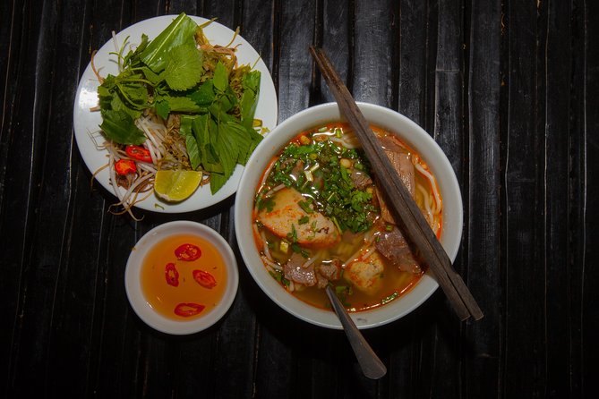 Saigon Night Street Food and City Tour on Scooter - Stop 1: Vietnamese pancakes that set the tone
