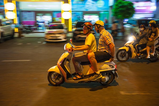 Saigon Night Street Food and City Tour on Scooter - The short sightseeing ride: night lights, not long detours