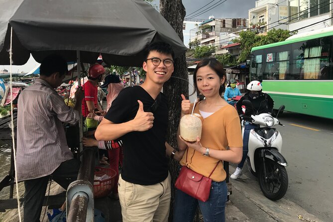 Saigon Slum tour and Saigon Chillspots by motorbike/ Aodai rider - The charity food stand: understanding daily life through a bite