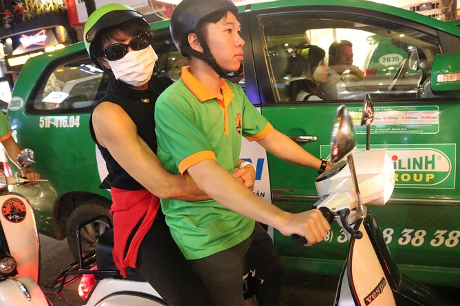 Saigon Vespa By Night Street Food Tour 4,5 Hours - Starting by Ho Chi Minh Square: getting your bearings fast