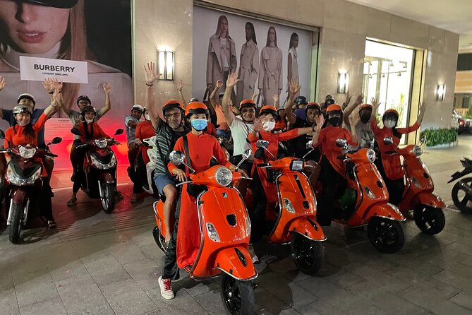 Saigon Vespa By Night Street Food With Female Riders Ao Dai - Stop 1: Seafoods and Saigon-style street dishes to set the tone