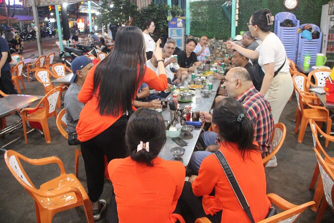 Saigon Vespa By Night Street Food With Female Riders Ao Dai - Stop 4: Night ride sights plus a music bar finish