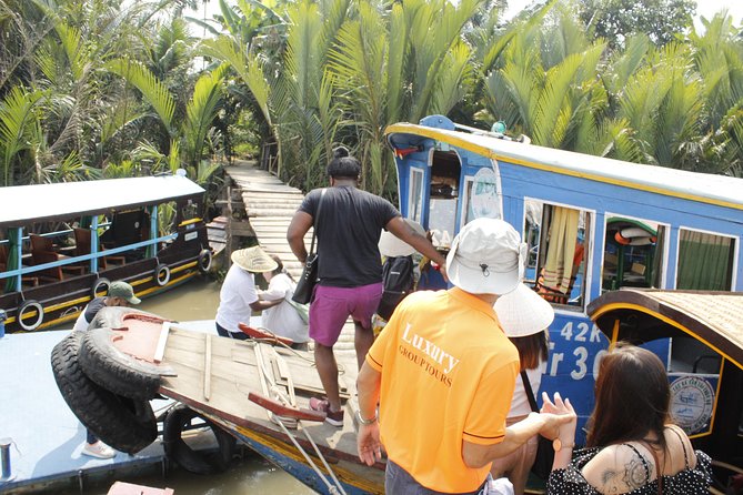 Shared Cu Chi Tunnels & Mekong Delta Tour Full Day - Food, Fruit, Honey Tea, and Folk Music Stops