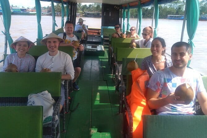 Small group tour Mekong Delta Full day - My Tho first: Vinh Trang Pagoda, river views, and honey tea
