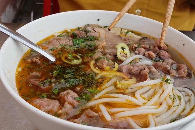 Super Niche Walking Street Food Tour in Ho Chi Minh City - The District 3 opener near Nguyen Thien Thuat apartment buildings
