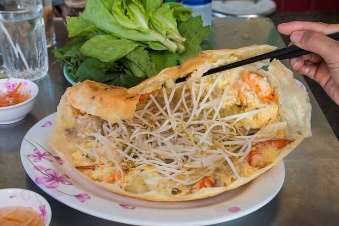Super Niche Walking Street Food Tour in Ho Chi Minh City - Ho Thi Ky Flower Market: a sensory break before the next round of eating