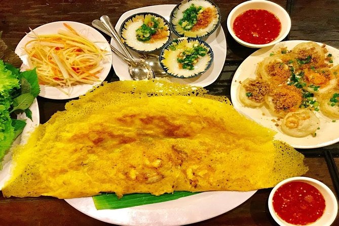 Taste the Unreal Street Food Walking Tour in Saigon - District 3 + a food guide who helps you eat like a local