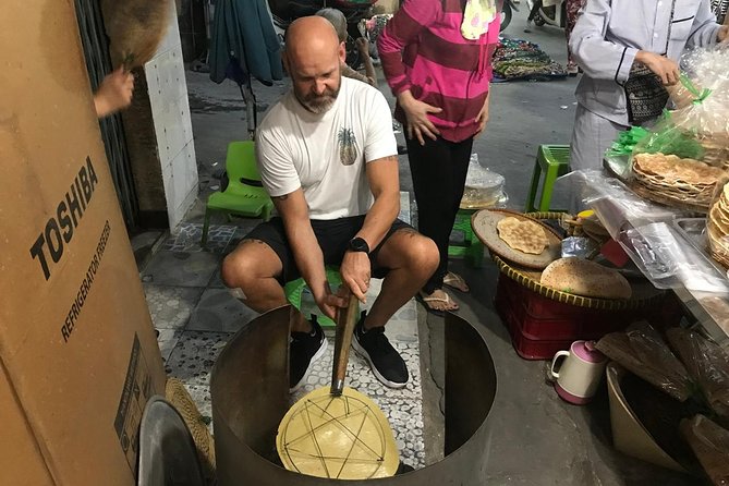 The Unique Ao Dai Street Food Tour By Scooter - Stop 4: Ho Thi Ky Flower Market wander (30 minutes, admission included)